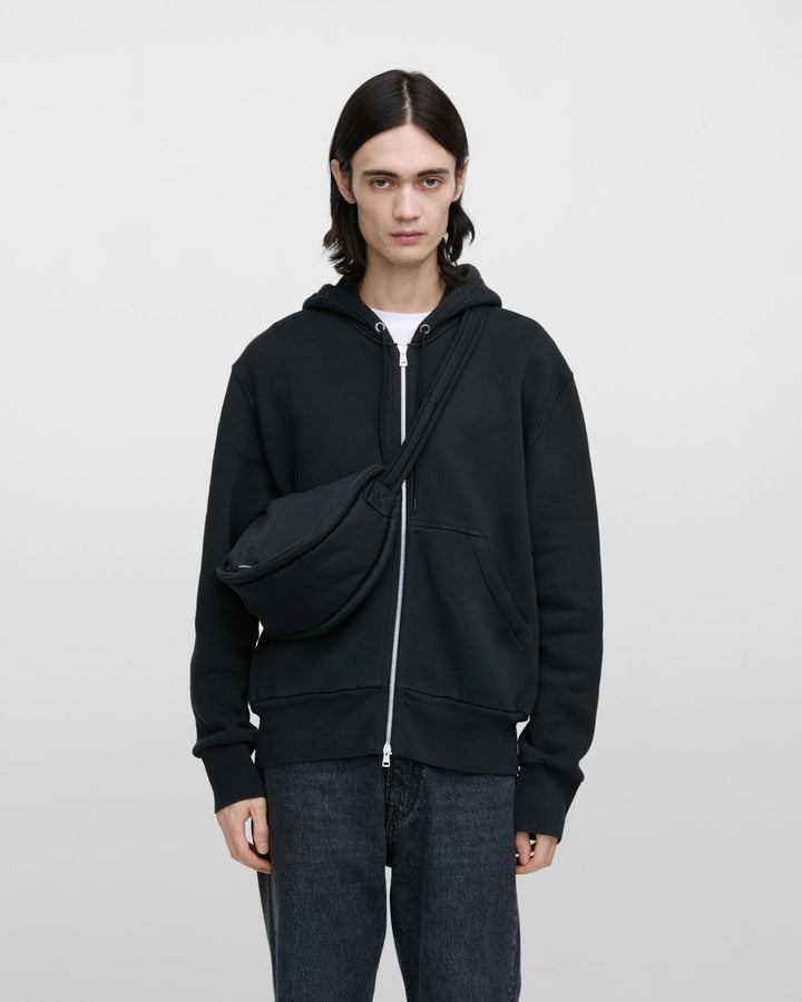 カーブ クロスボディバッグ ラウンド型 小さめ ブラック