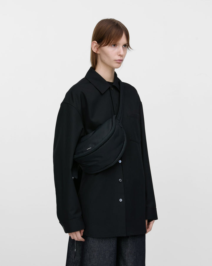 カーブ クロスボディバッグ ラウンド型 小さめ ブラック