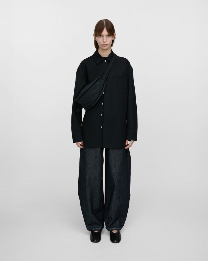 カーブ クロスボディバッグ ラウンド型 小さめ ブラック