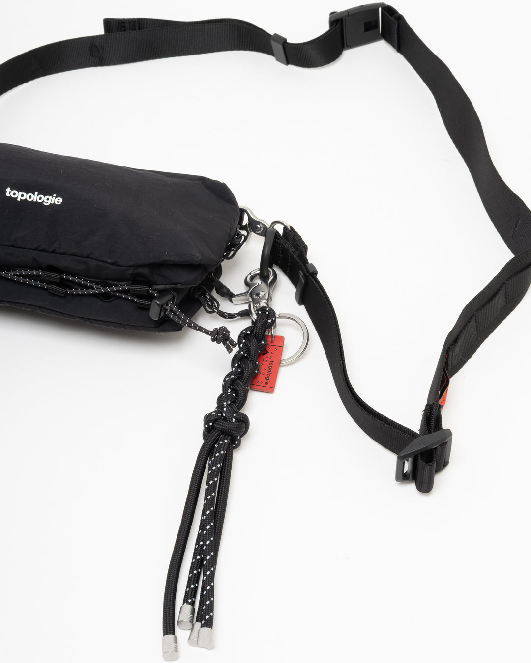 Topologie Bottle Sacoche Medium Black Papery + Utility Sling Wide Black Sinnet Keychain Black Reflective
